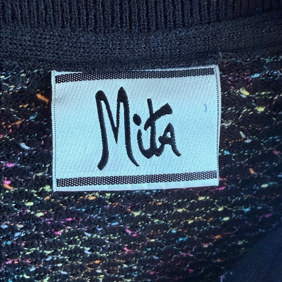 🧶 Vintage Mita Multicolor Knit Cardigan with Black Trim
Fits Like a Medium - Picture 2 of 6